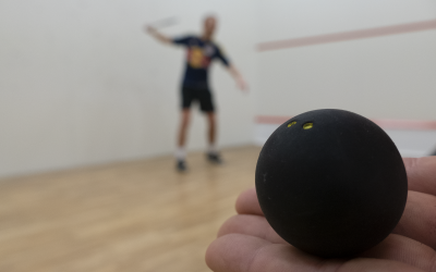 Playing tennis inside a room